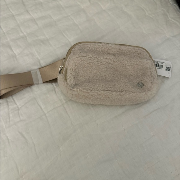 lululemon athletica Handbags - lululemon athletica Shearling Crossbody Belt Bag in Light Beige